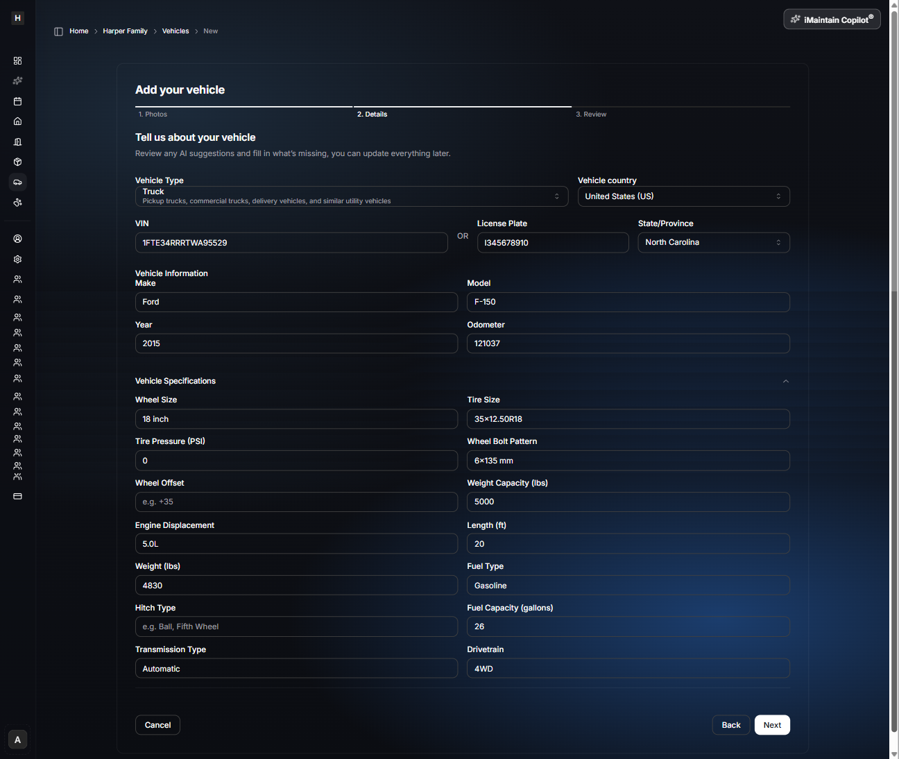 Add your vehicle wizard Step 2 Details showing fields for vehicle type, VIN or license plate, make, model, year, odometer, and vehicle specifications