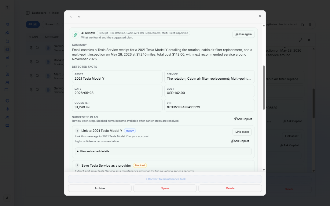 Inbox AI review showing a suggested plan to link a service receipt to a vehicle and log maintenance